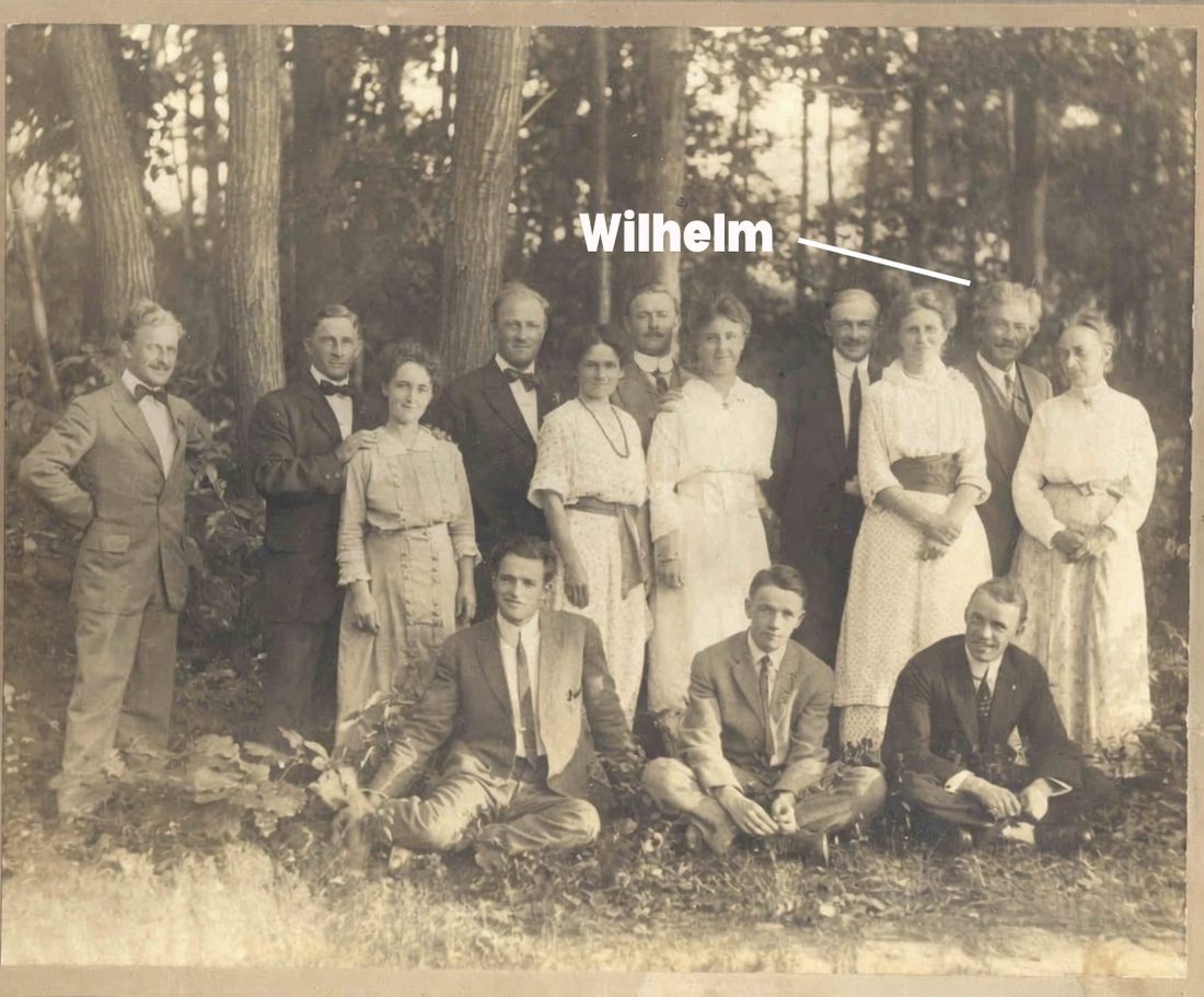 The Wilhelm family, gathered before the crossing — Wilhelm marked